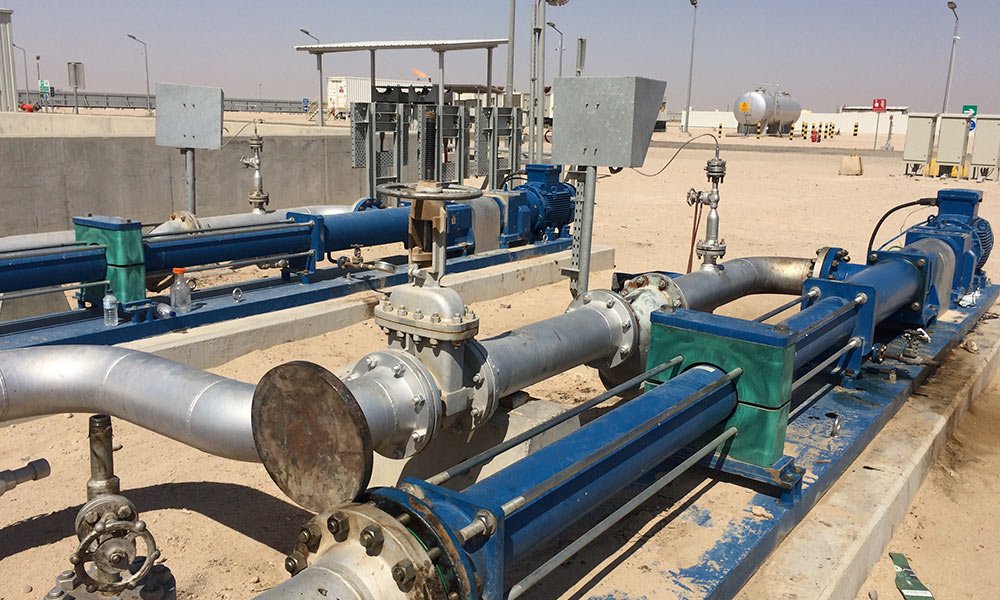PCM multiphase boosting pumps for reducing high oil wellhead pressure
